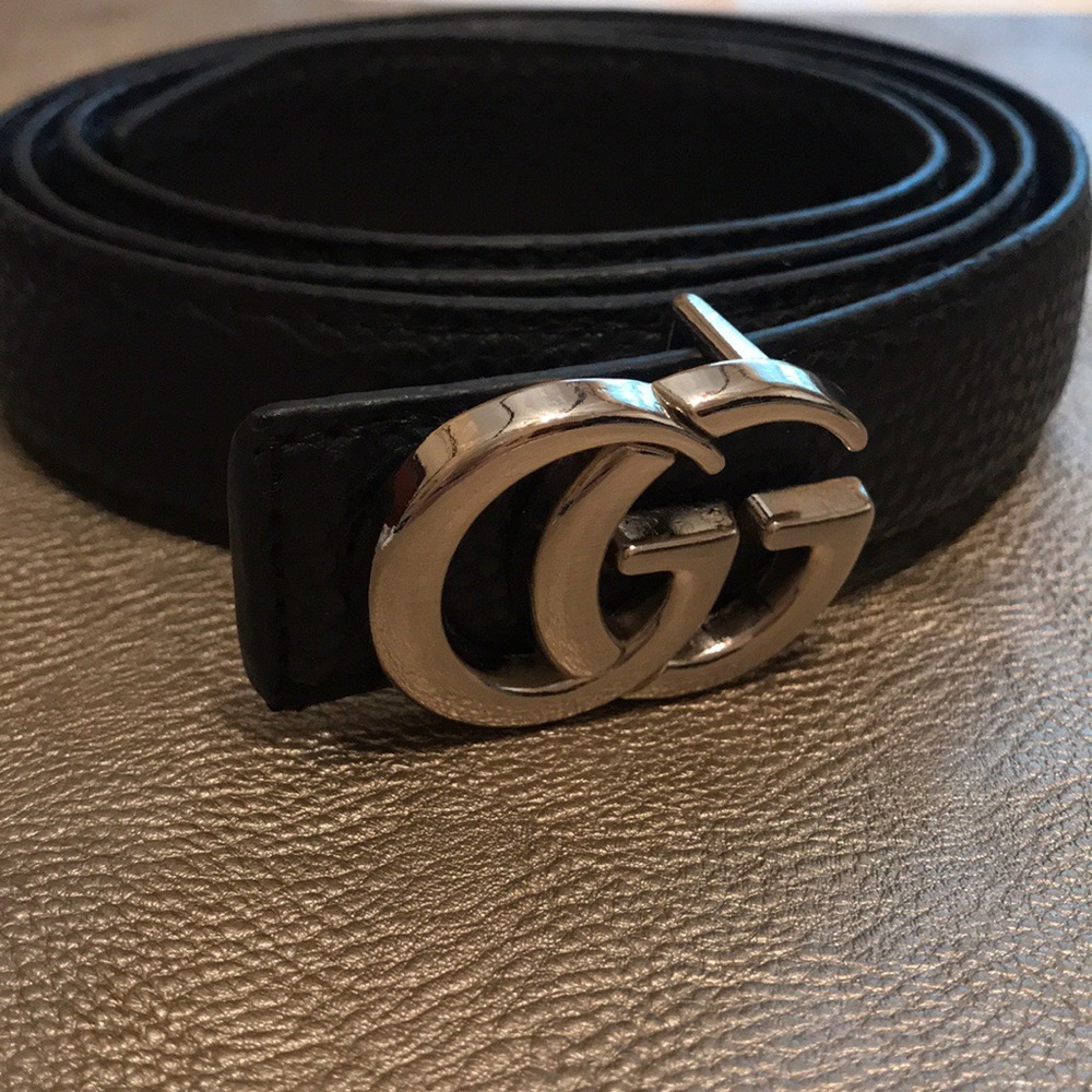 Black Gucci belt, silver Gucci clasp